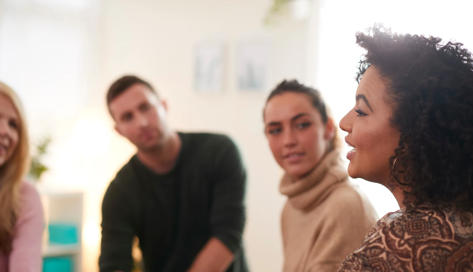 An addiction counselor leading a group
